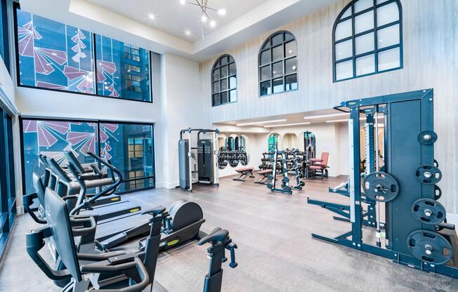 A light-filled fitness studio at Modera University Park, supporting your routine with easy access to University Park’s trails and green spaces.