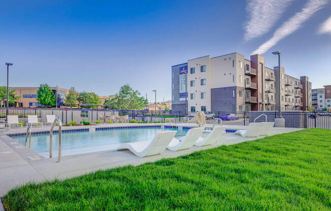 take a dip in the pool at the bradley braddock road station apartments at Copper 87, West Jordan Utah