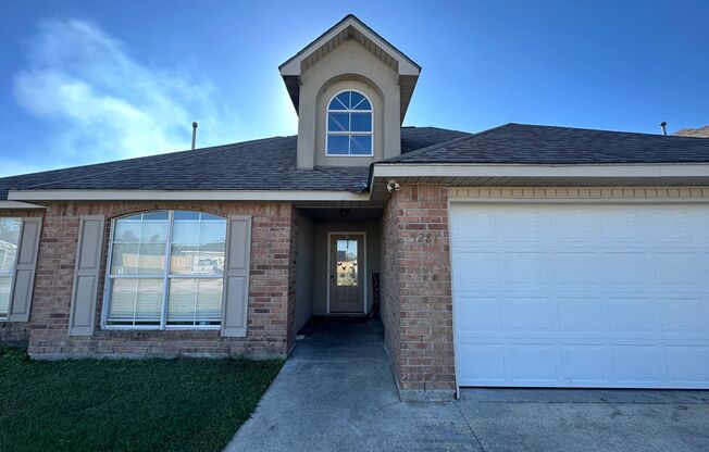 Beautiful Brick 4 Bedroom/2 Bath home in Ascension Trace Subdivision Available NOW!