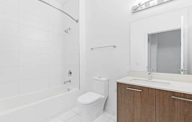 Bathroom photograph of living and lining area at townhome unit in Miami, FL.