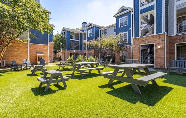 Apartments in Houston, TX for Rent – Gramercy Park - our picnic tables are in the courtyard of our apartments