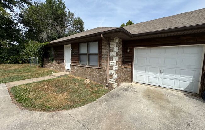 Recently updated 2 bed 1 bath Duplex with garage available now!