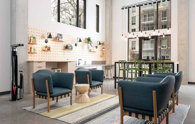 A room with a row of chairs and a wall with shelves and plants.