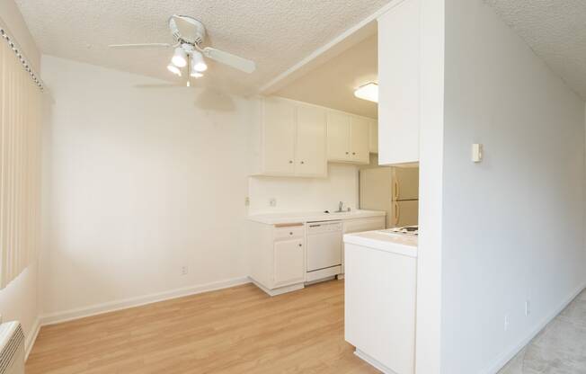 Dining Room with Hardwood Floors and Fan