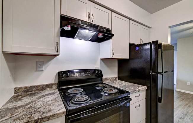 Updated Kitchen With Black Appliances at Highland Club Apartments, Watervliet