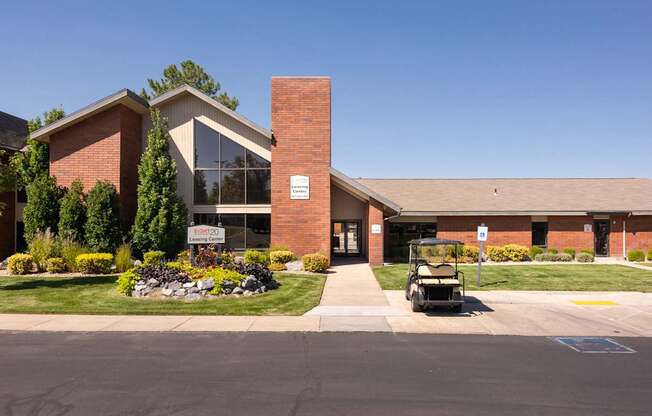 a building with a golf cart parked in front of it