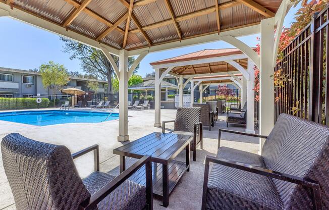 a couple of lawn chairs sitting on top of a table