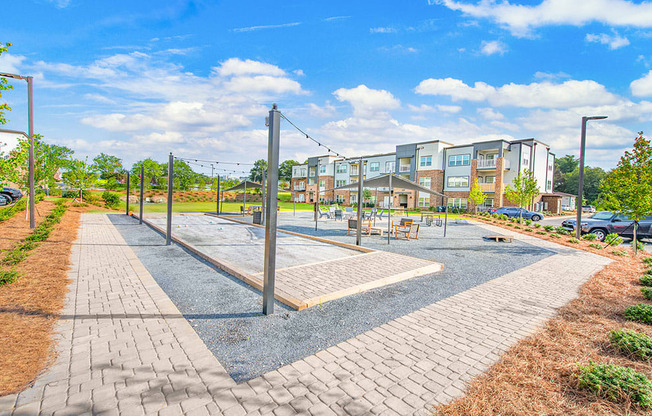 Community green and game area bocce ball court