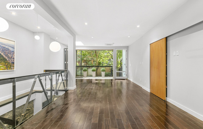 448 W 25 ST