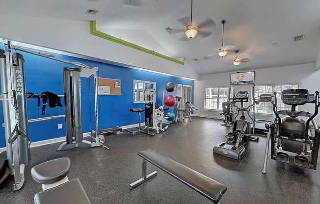 the apartments at masse corner 205 fitness room at St. Johns Forest Apartments, Florida, 32277