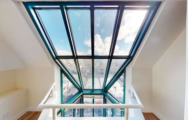 a large skylight fills the top floor of this home with natural light