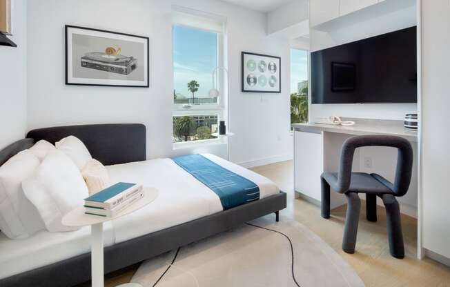 Bedroom With TV at Miles at Harvard, Los Angeles, California