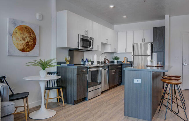 Model apartment home dining room and kitchen/island