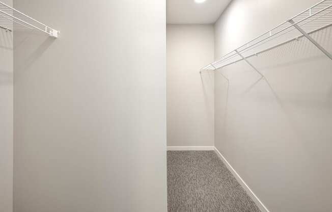 Studio, one two and three bedroom apartments and townhomes featuring open concept floor plans, dens, large windows, stainless steel appliances, quartz countertops, eat-in kitchens, pantries, LVT flooring and much more at The Trails at North Streams in Omaha, NE