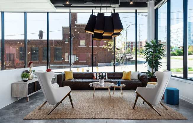  lobby with communal seating and stylish lighting at Steelcote Square, Missouri, 63103