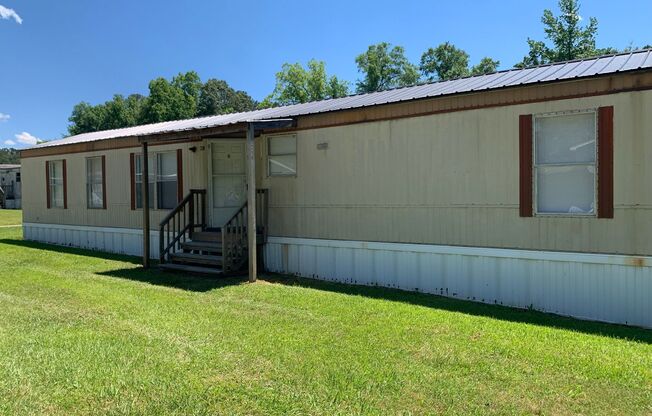 Available Now - Spacious 2 Bedroom + Bonus Room, 2 Bath Mobile Home