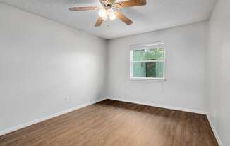 Bedroom at The Villas at Quail Creek Apartments in Austin Texas June 2021