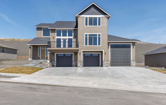 Luxury 4 Bedroom Home in Southridge w/4 car garage and RV Bay!!