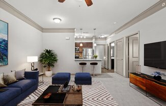 a living room with couches and a coffee table