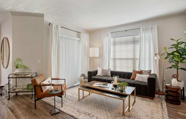 a living room with a couch and a coffee table at Volare at the Woodlands, The Woodlands, TX, 77384