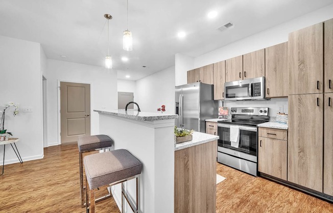 a kitchen with a counter top and a refrigerator