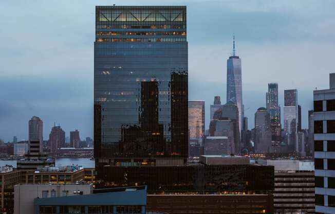the skyline of the city at dusk at The Lively, Jersey City, NJ 07302