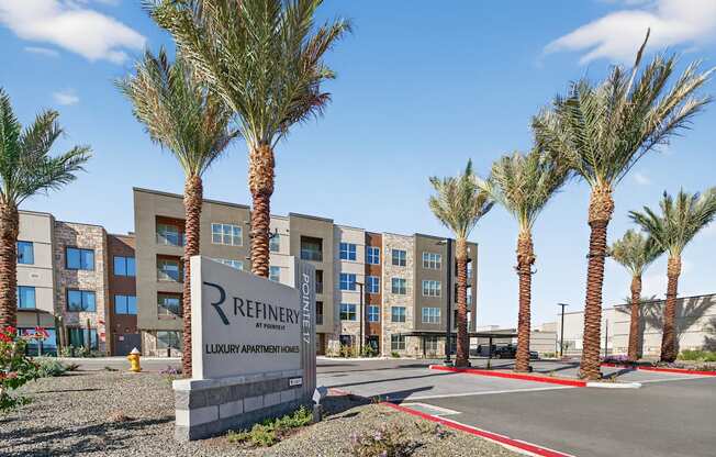 Outdoor signage infront of apartment building