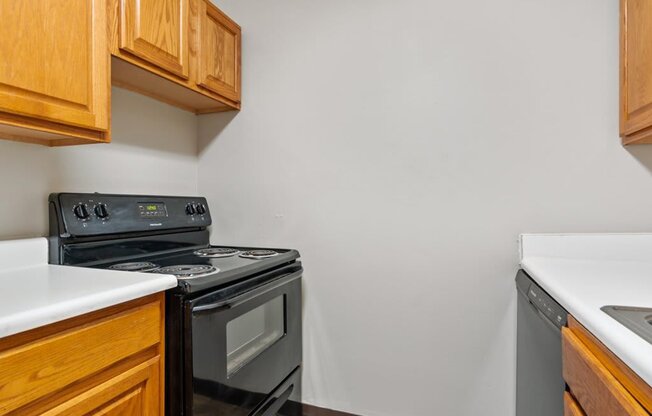 a kitchen with a stove and a sink