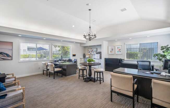 the preserve at ballantyne commons clubhouse with dining area and living room