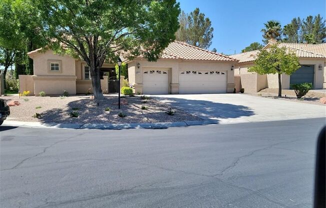 EXQUISITE SEM-CUSTOM HOME ON 1/2 ACRE IN GATED NW COMMUNITY