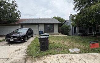 Soon to be renovated 2 bedroom/2 bath duplex with garage and fenced yard