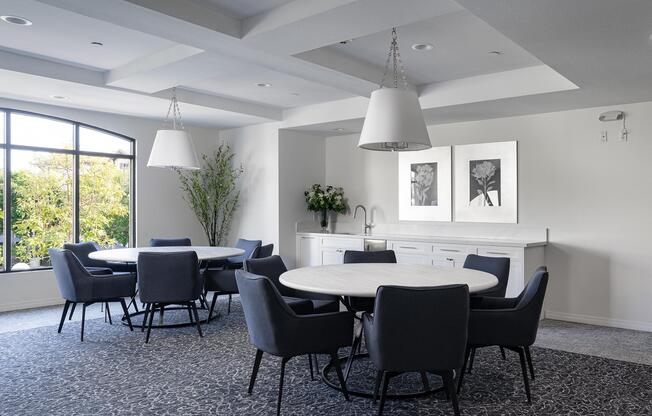 a living room filled with furniture and a table