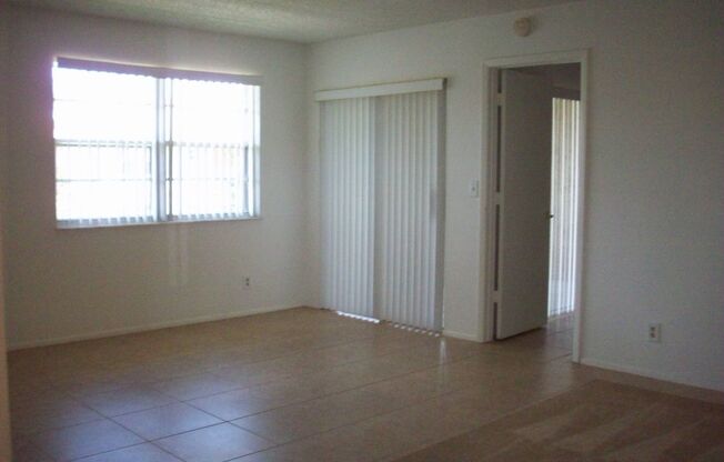 Two Bedroom Condo In Midport Place II  Tile floors  2nd story unit.