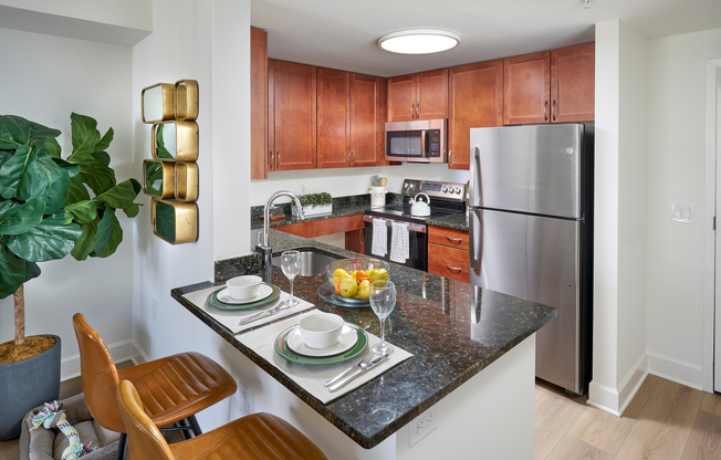Modern living starts here. Our newly renovated kitchens now feature stainless steel appliances and wood-style vinyl plank flooring to complement custom cabinetry and granite countertops