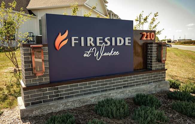 Studio, one, and two-bedroom apartment homes with stainless steel appliances, quarts countertops, designer cabinetry, large kitchens, luxury vinyl plank flooring, high vaulted ceilings, high-end lighting, in-unit washer and dryer, and energy efficient windows at Fireside at Waukee in Waukee, IA