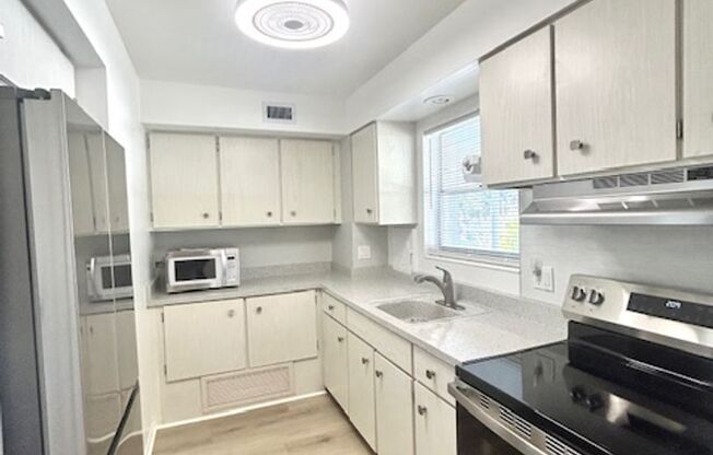 55+Community - ANNUAL 1/1 GREAT LOCATION - UPDATED UNIT WITH COMMUNITY HEATED POOL!