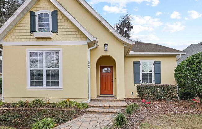 A Sunlit Custom Yellow Cottage in Greystone - Where Comfort Lives!