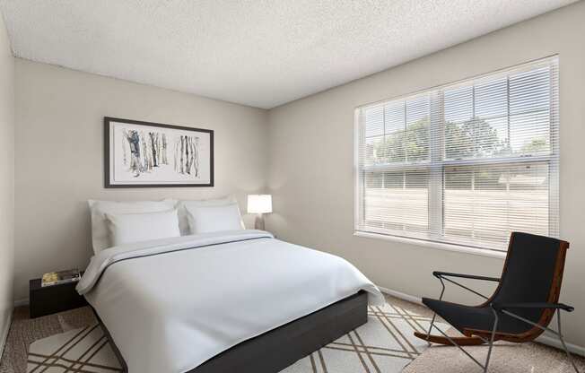 a bedroom with a large bed and a window at Arcadia Apartments, Centennial, CO 80112