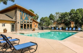 copper flats main pool with blue lounge chairs on the left