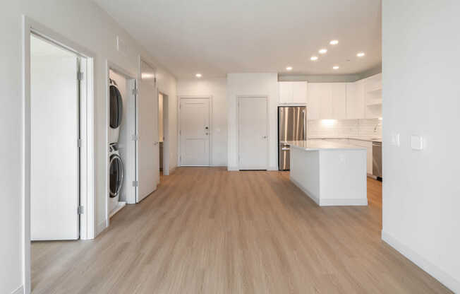 Living Room with In-home Washer and Dryer