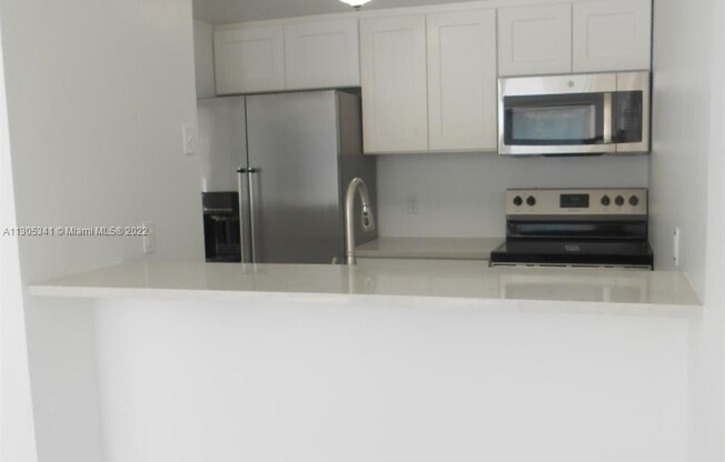1225 NE 124th St