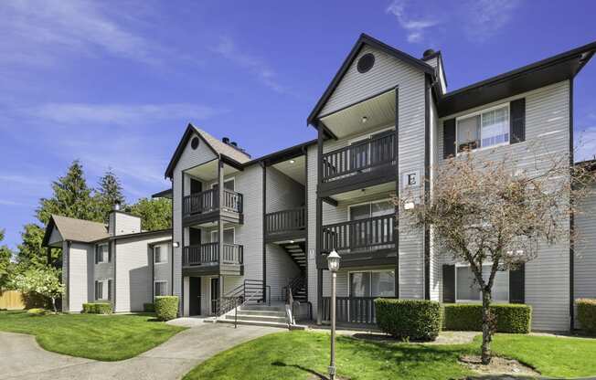 Property Front View with luxe looking property and manicured landscaping at Serra Vista Apartment Homes, Washington, 98087