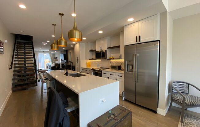 Modern 2 Bed | 3.5 Bath Townhome with Bonus Loft & Rooftop Deck!