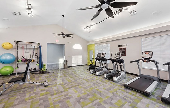 Community Fitness Center with Equipment at Vue at Baymeadows Apartments in Jacksonville, FL.