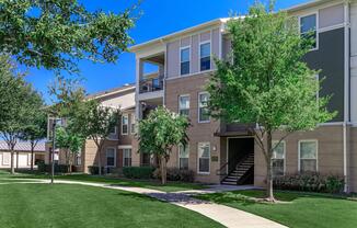 a large lawn in front of a house
