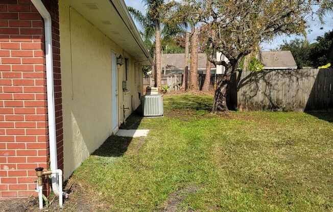 Enjoy Peaceful Living in this Northdale Corner Lot Single Family Home
