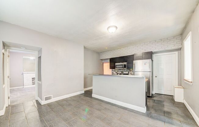 AVAILABLE NOW - 3 Bedroom Home w/ GARAGE! Ask how you can get up to one month of free rent!
