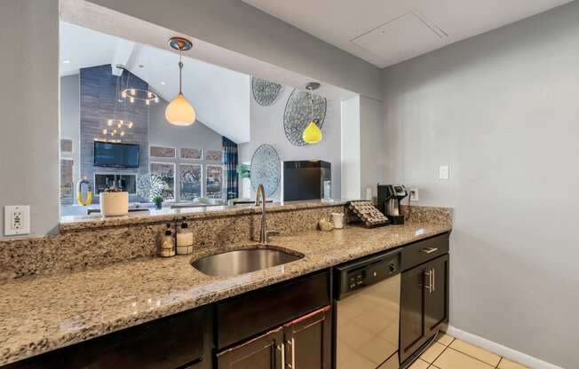 a kitchen with granite countertops and a large window at Misty Ridge Apartments, Virginia, 22191