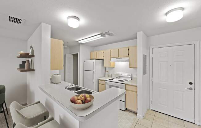 Kitchen with white appliances and wood cabinets