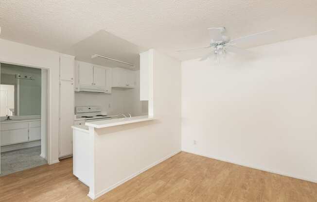 Dining Room with Hardwood Floors and Fan